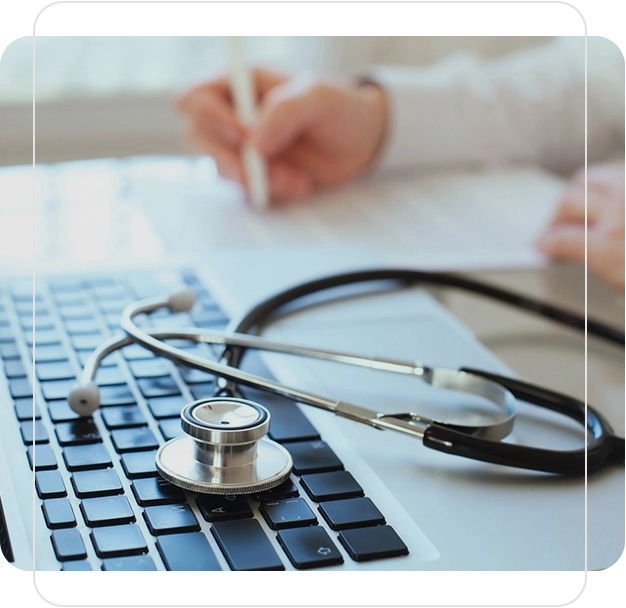 A stethoscope sitting on top of a keyboard.